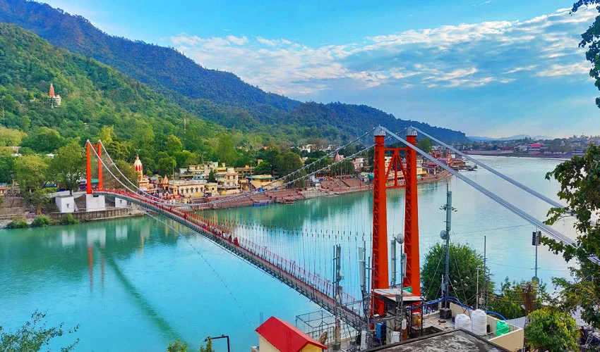 Ram Jhula suspension bridge over the Ganga River in Rishikesh